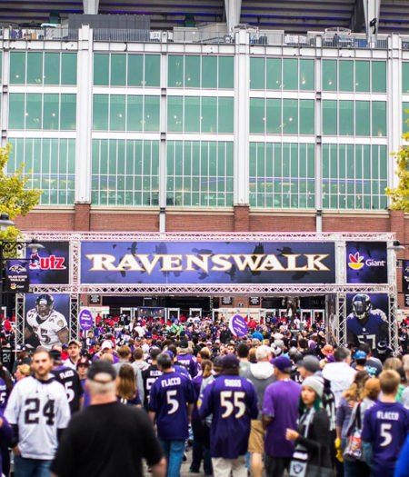 Ravens fans heading into M&T Bank Stadium on gameday.