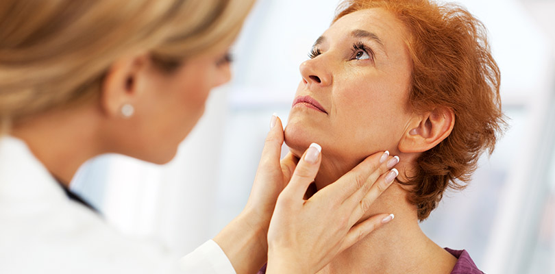 Female doctor examining her patient.