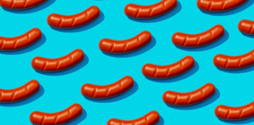 hot dogs on a blue background