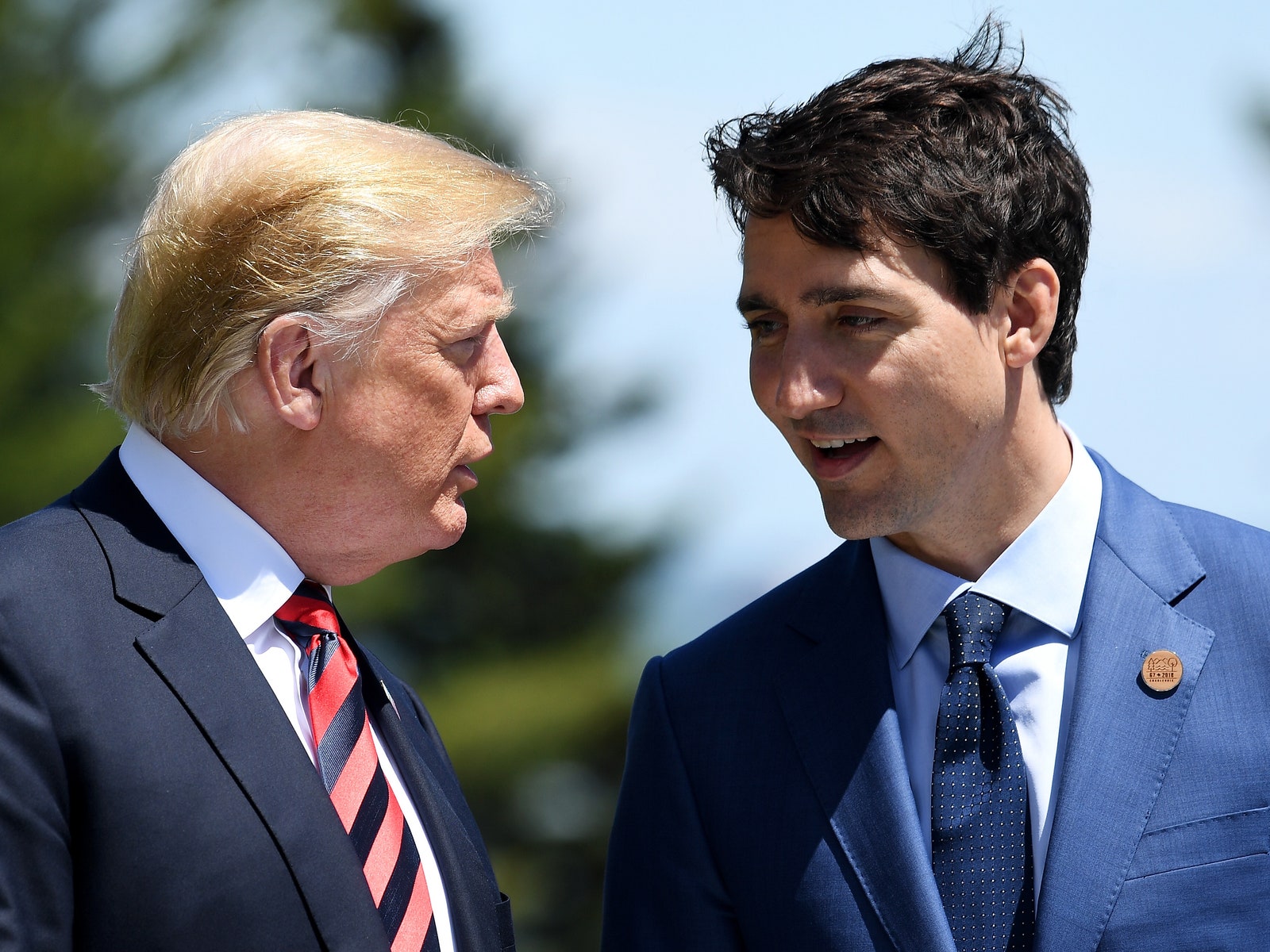 Image may contain Justin Trudeau Donald Trump Accessories Formal Wear Tie Adult Person People and Photography