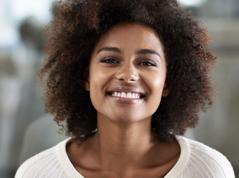 A woman smiling